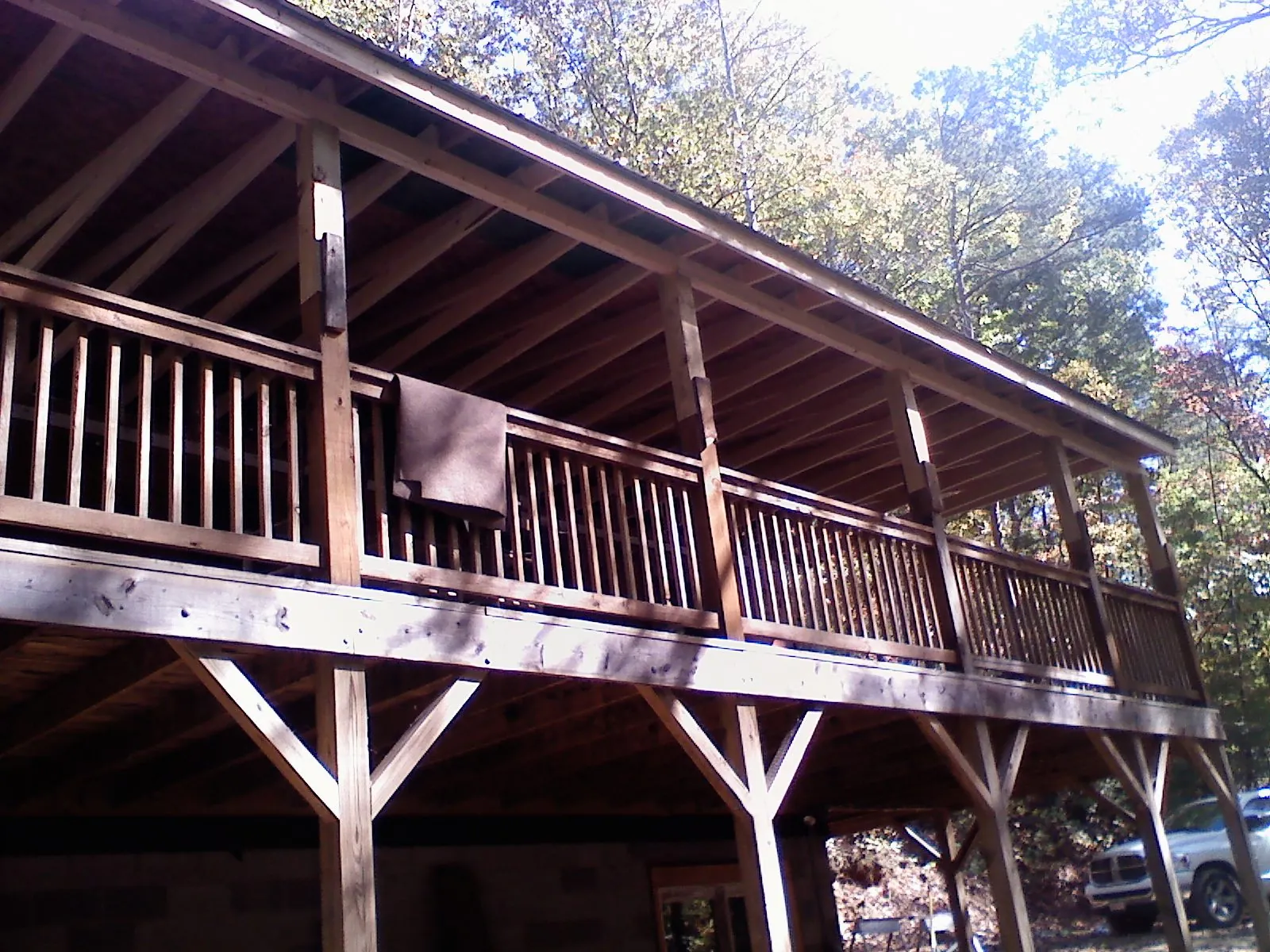 Timber framing under a new elevated porch and deck — Roof Leak Repair in Moravia by Roofing Brothers